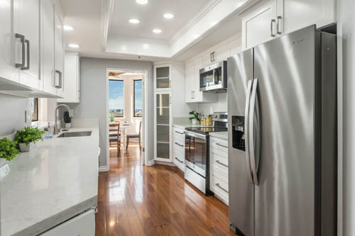Remodeled kitchen in the Village condos
